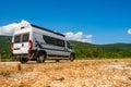 Campervan, Motorhome RV parked on the side of the road, Meteora, Greece